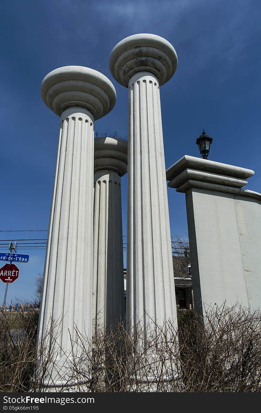 Modern colums in front of a new construction area