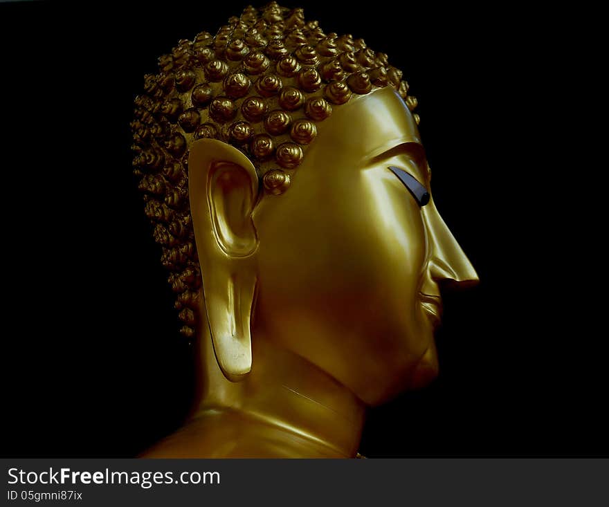 Buddha in black background from Thailand