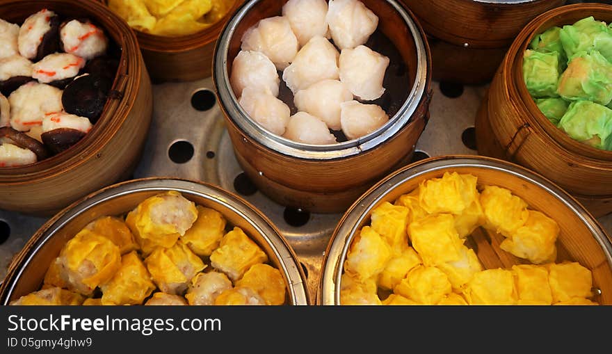 Chinese appetizer, in a bamboo dish. Chinese appetizer, in a bamboo dish.