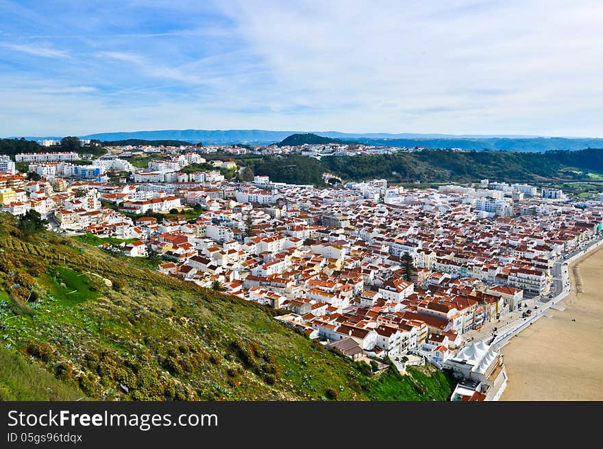 Aerial view of a resort town of Nazare in Portugal. Aerial view of a resort town of Nazare in Portugal.