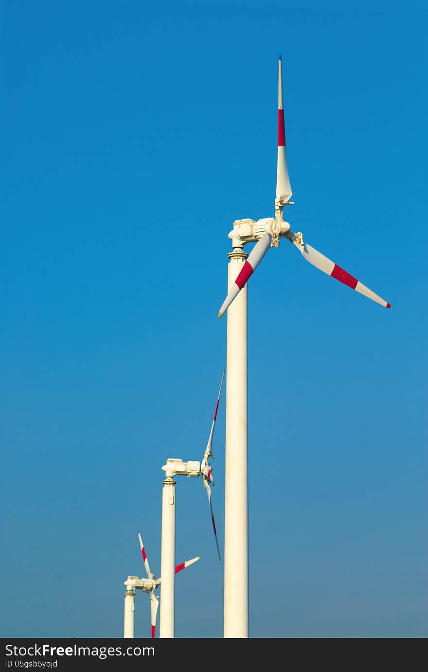 Wind turbine for generating electricity on blue sky