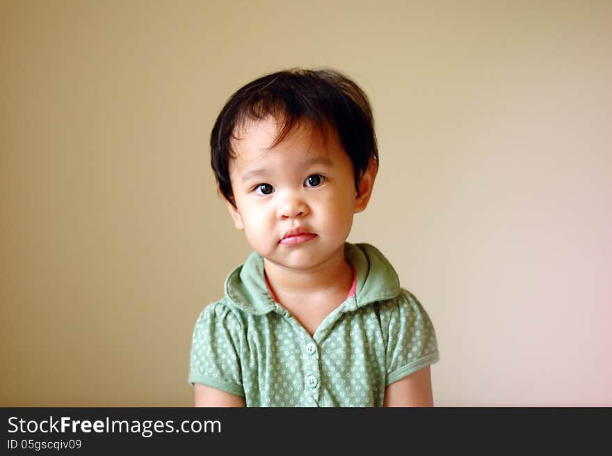 Attentive kid with look from her eyes