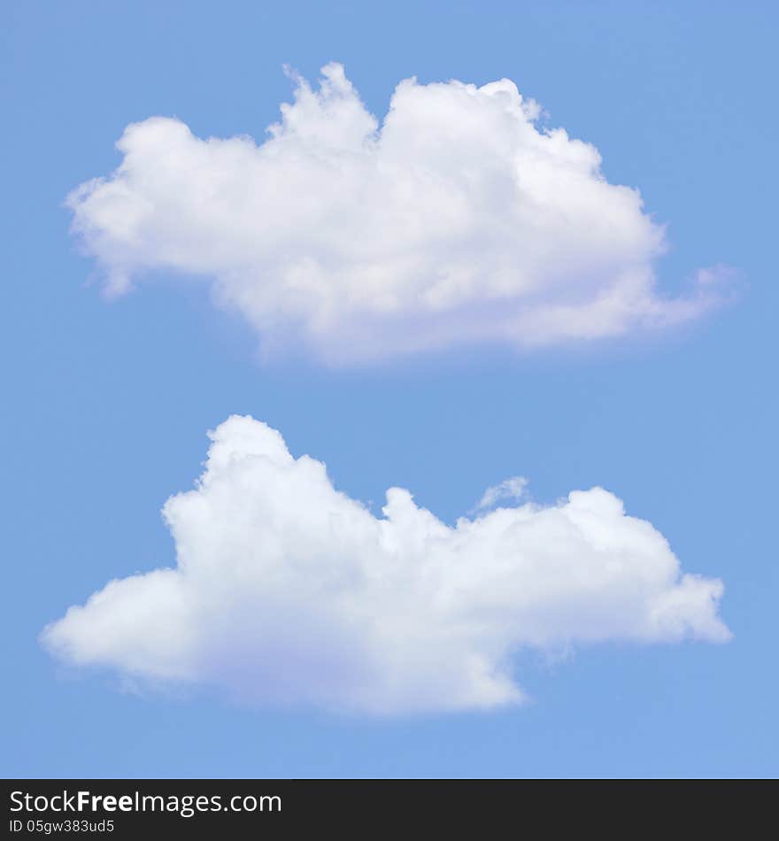 Two clouds with blue sky background