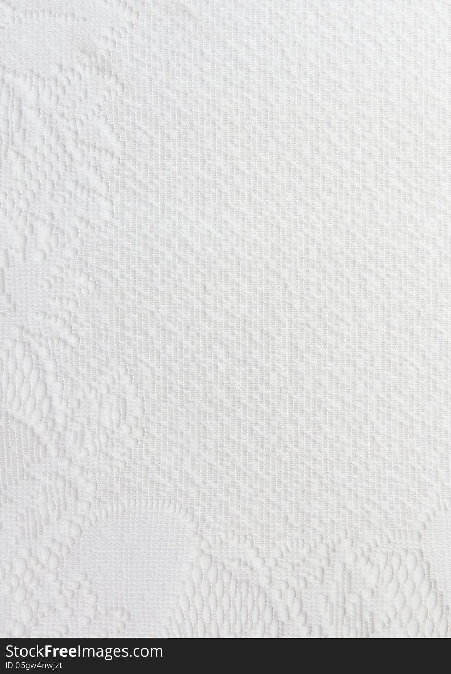 White fabric texture with flowers for background