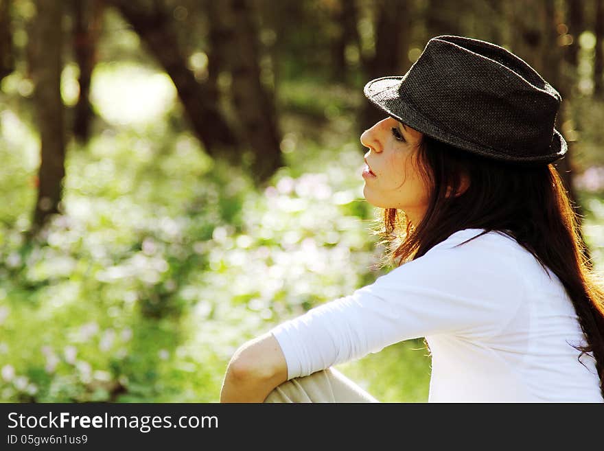 Portrait of beautifull 35 years old woman in spring forest