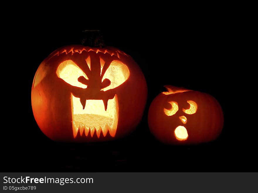 Two Jack-o-lantern's with humorous expressions. Two Jack-o-lantern's with humorous expressions.