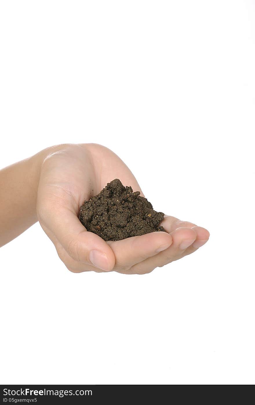 Woman hand hold soil isolated over white background. Woman hand hold soil isolated over white background