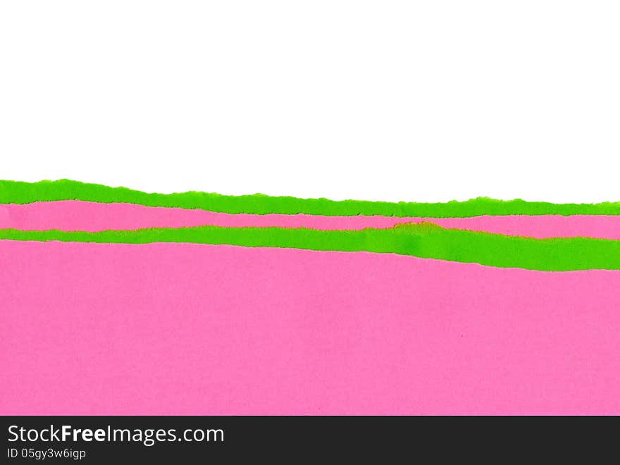 Pink and green strips of paper with the ragged edge