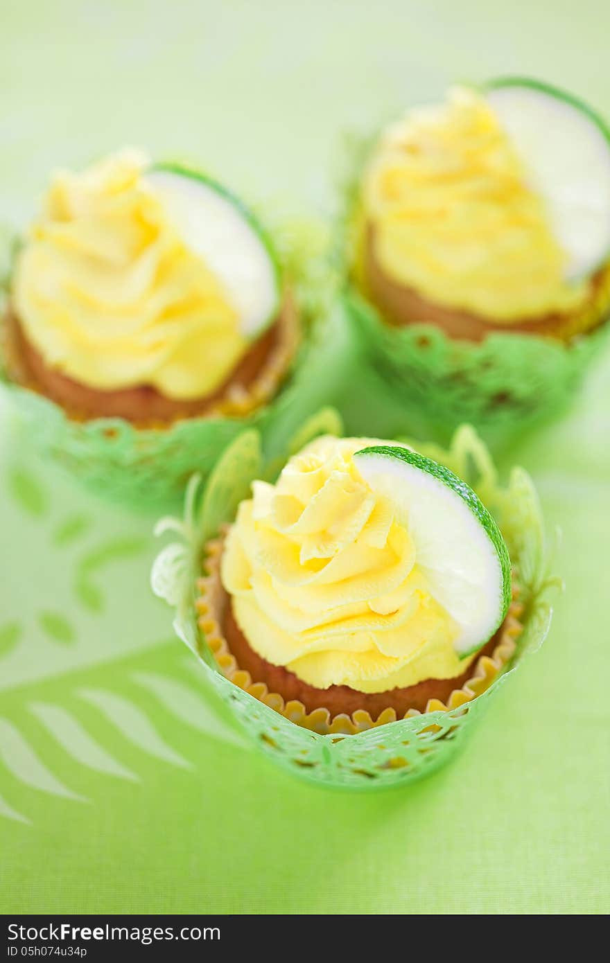 Lime cupcake with lemon cream, soft focus