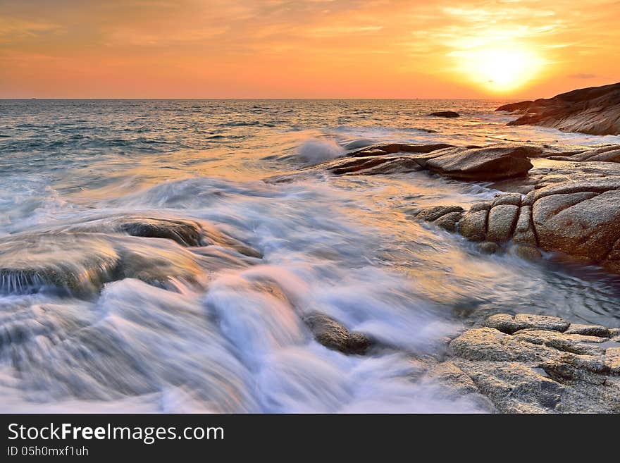 Sea wave on the beach at sunset time. Sea wave on the beach at sunset time