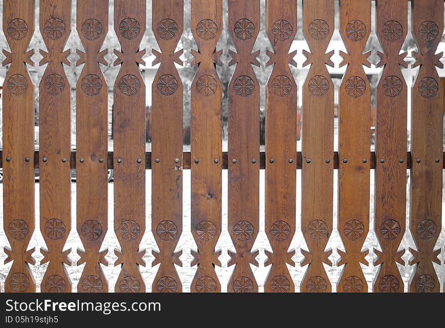 Closeup of a traditional wooden gate from Lainici Monastery