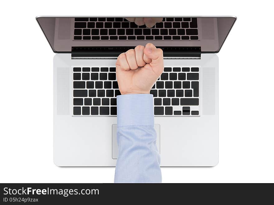 Top view of modern retina laptop with a man's fist pointing at the screen on white background. You can put any image on the screen, while retaining reflection of keyboard. Top view of modern retina laptop with a man's fist pointing at the screen on white background. You can put any image on the screen, while retaining reflection of keyboard.