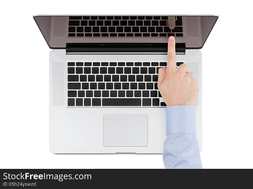 Top view of modern retina laptop with a man's hand pointing at the screen on white background. You can put any image on the screen, while retaining reflection of keyboard. Top view of modern retina laptop with a man's hand pointing at the screen on white background. You can put any image on the screen, while retaining reflection of keyboard.