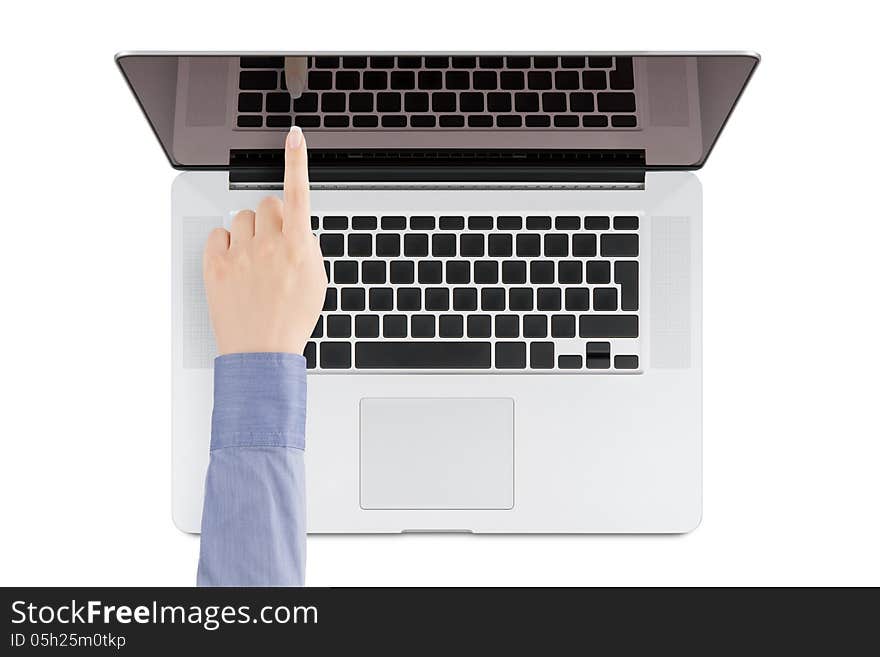 Top view of modern retina laptop with a woman's hand pointing at the screen on white background. You can put any image on the screen, while retaining reflection of keyboard. Top view of modern retina laptop with a woman's hand pointing at the screen on white background. You can put any image on the screen, while retaining reflection of keyboard.