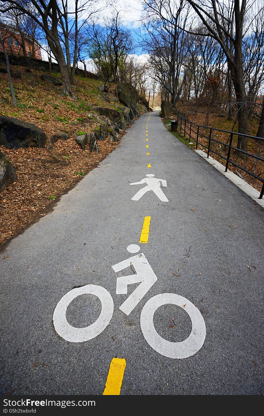 Street markings indicating passage for bicycles and pedestrians in the washington heights park. Street markings indicating passage for bicycles and pedestrians in the washington heights park