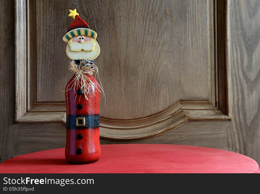 Christmas Ornament by a wooden door