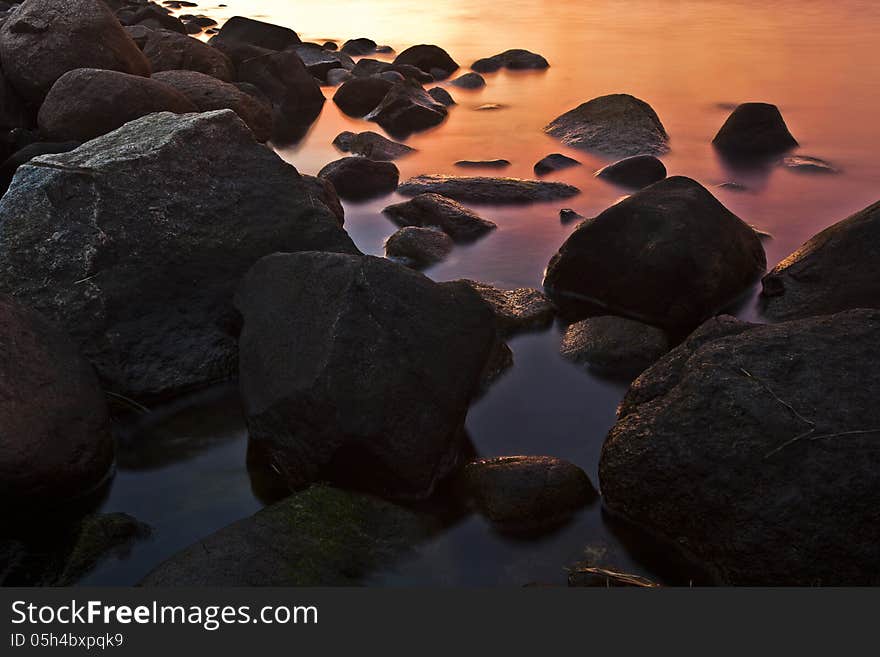 Sunset in sea, coloful reflection.