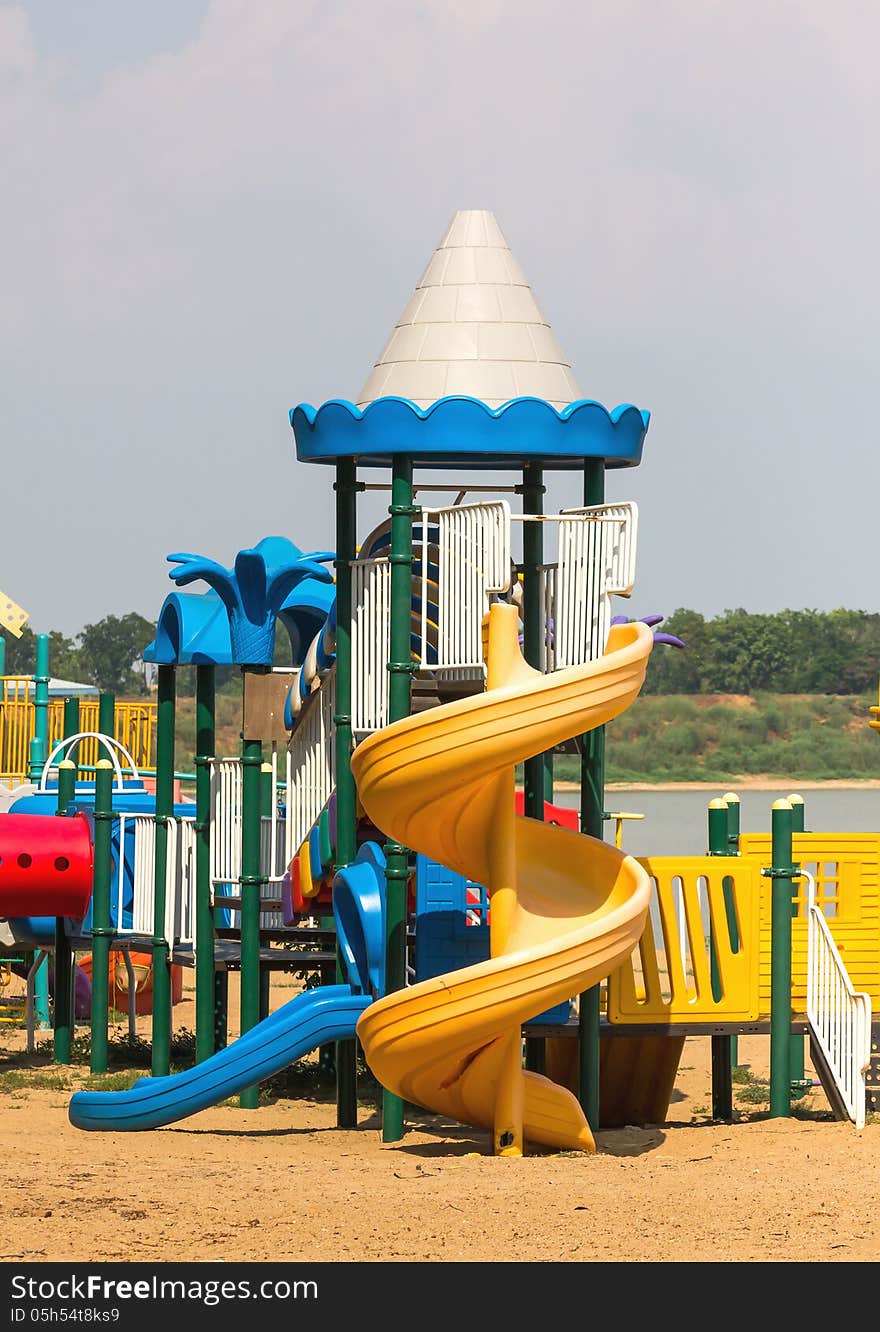 Modern children playground in park without children