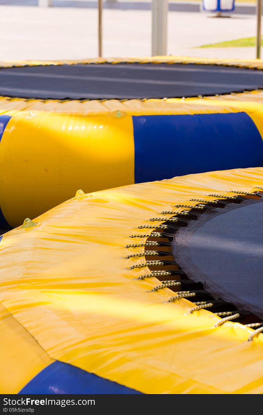 Part of yellow blue strip trampoline. Part of yellow blue strip trampoline