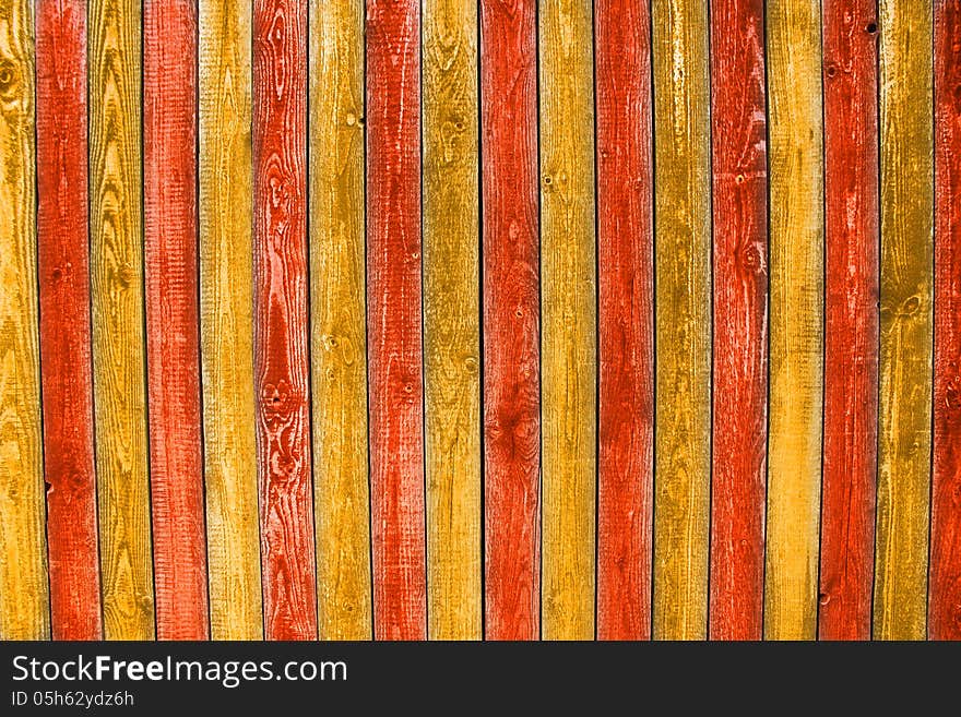 Old painted wooden planks in orange and red. Old painted wooden planks in orange and red