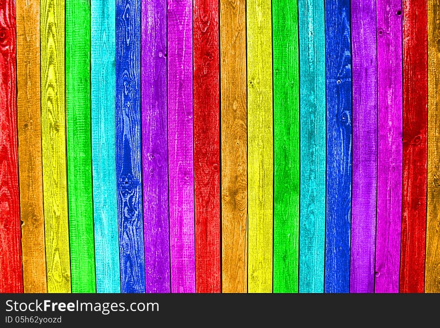 Old painted wooden planks in rainbow colors. Old painted wooden planks in rainbow colors