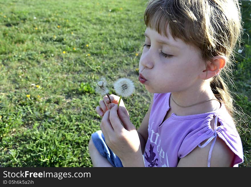 Girl with dandelion