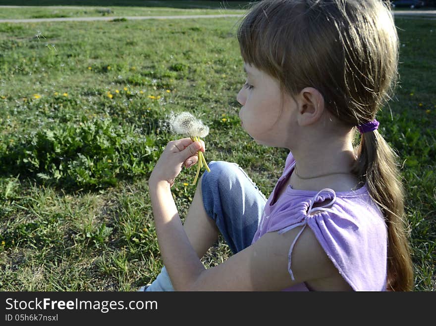 Girl with dandelion