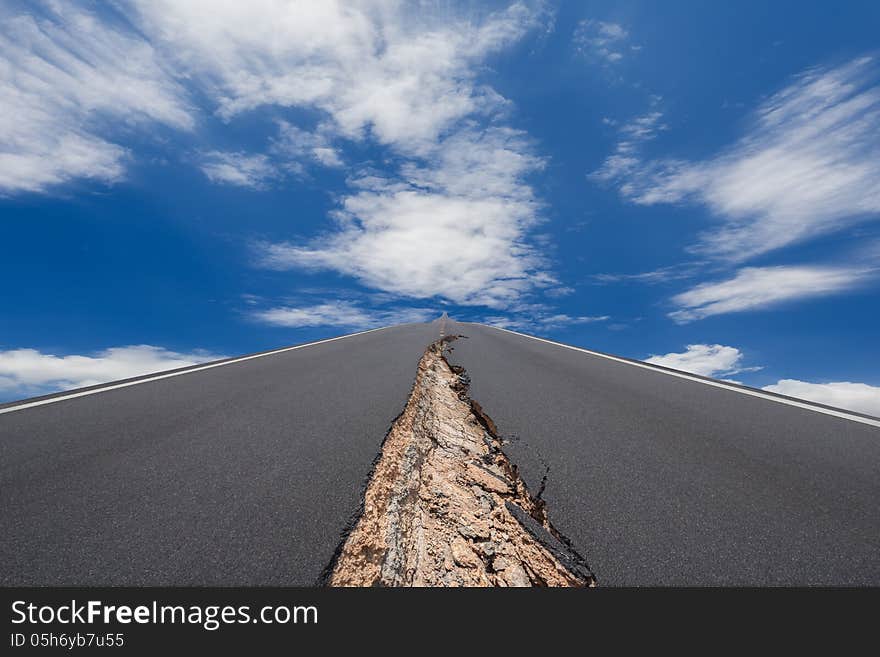 Cracked road with motion cloud background