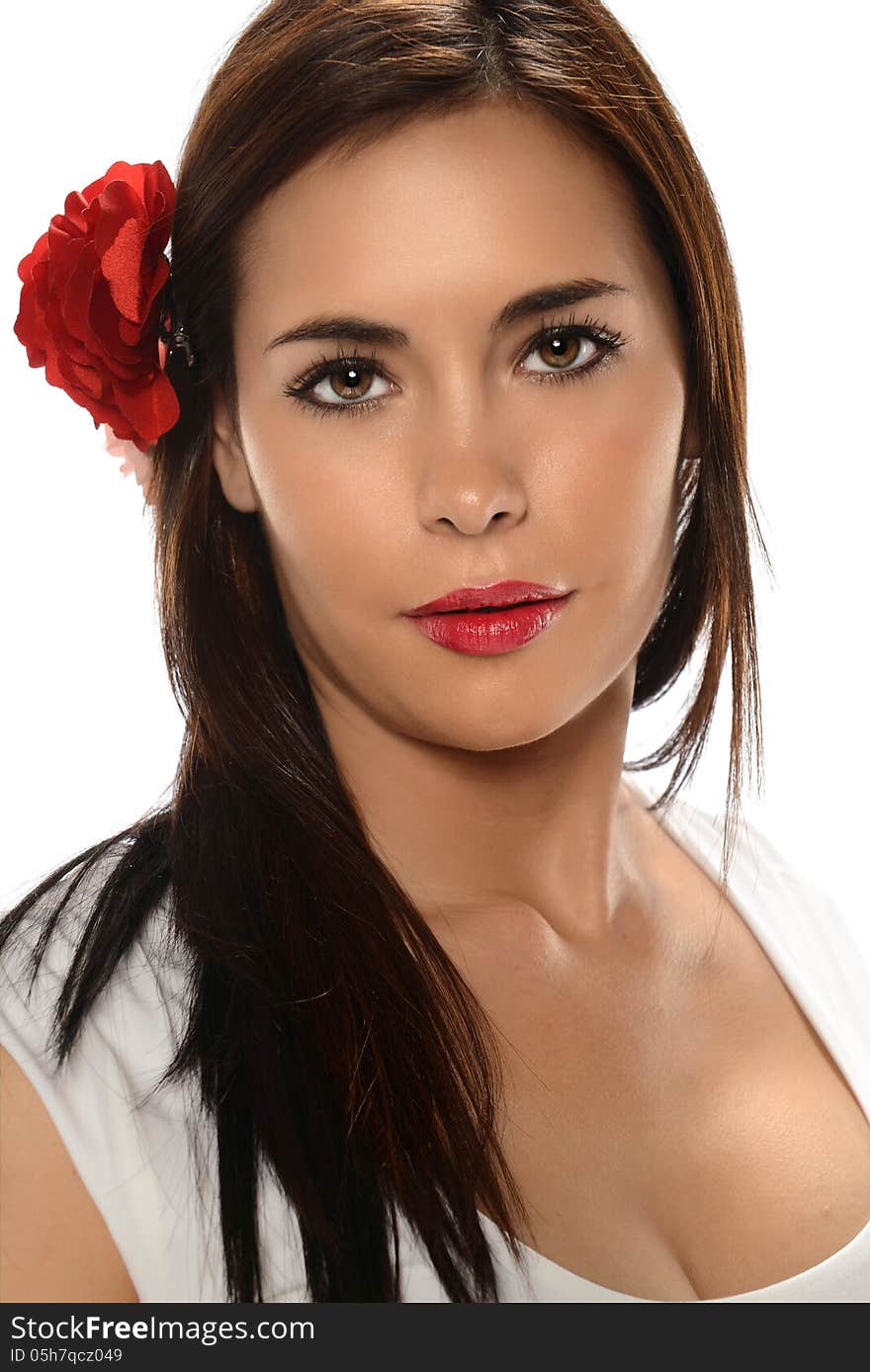 Portrait of young Hispanic woman with rose on her hair. Portrait of young Hispanic woman with rose on her hair