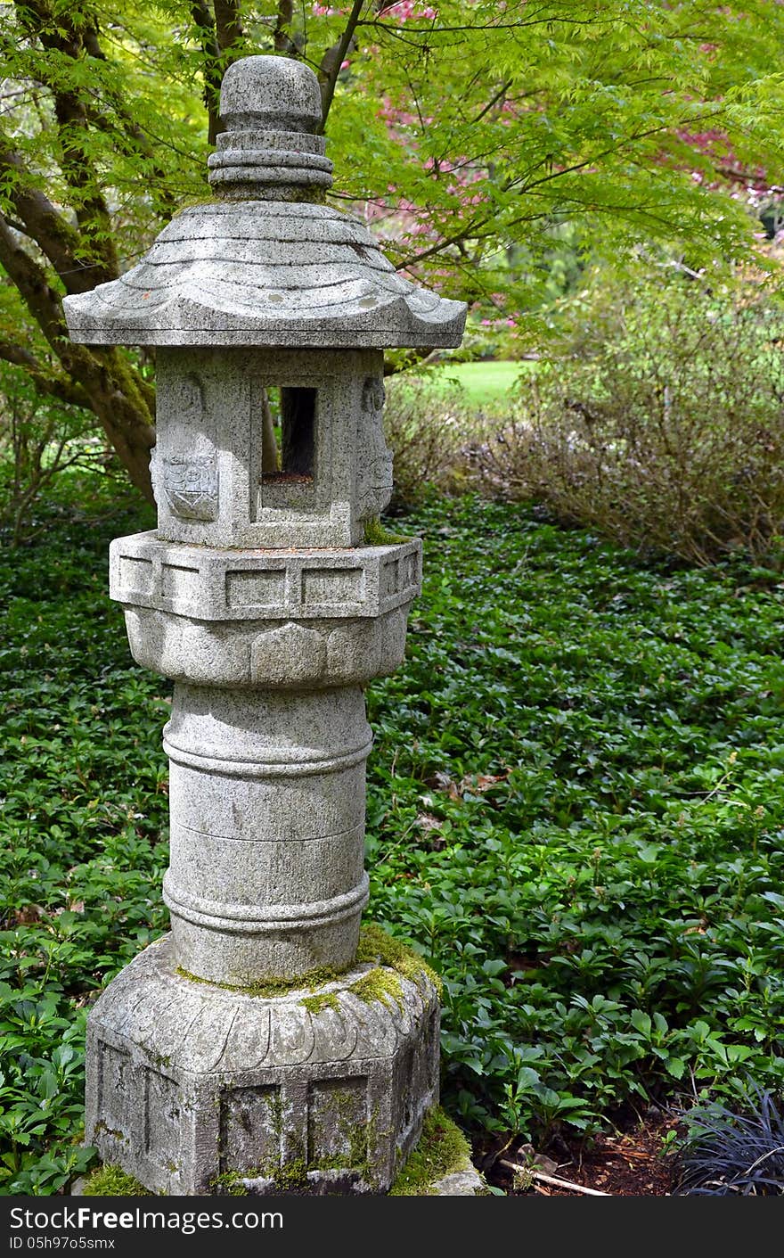 Japanese shrine in green garden park