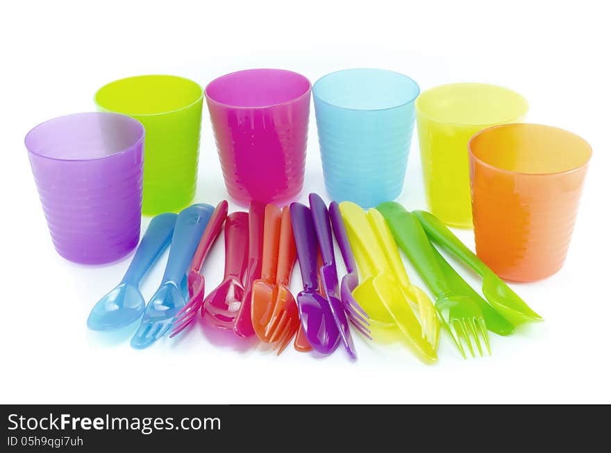 Plastic fork spoon and knife set on white background