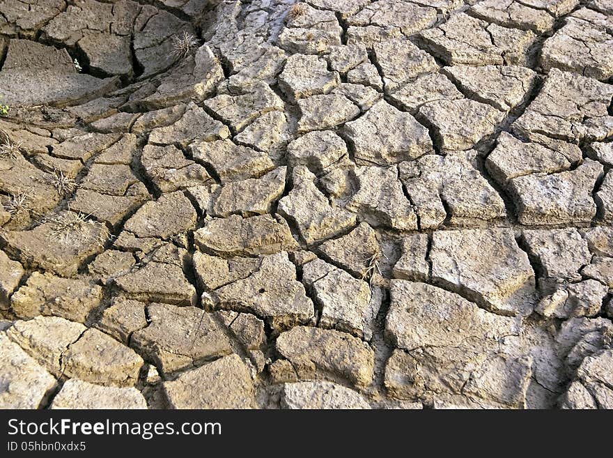 Cracked and dry land due to drought. Cracked and dry land due to drought