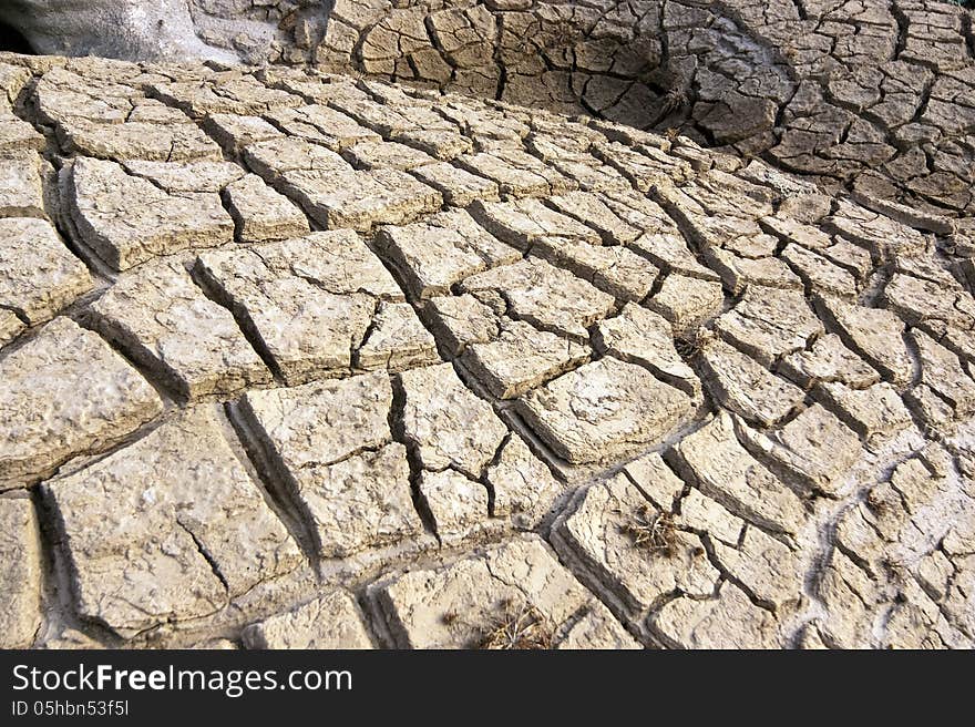 Cracked and dry land due to drought. Cracked and dry land due to drought