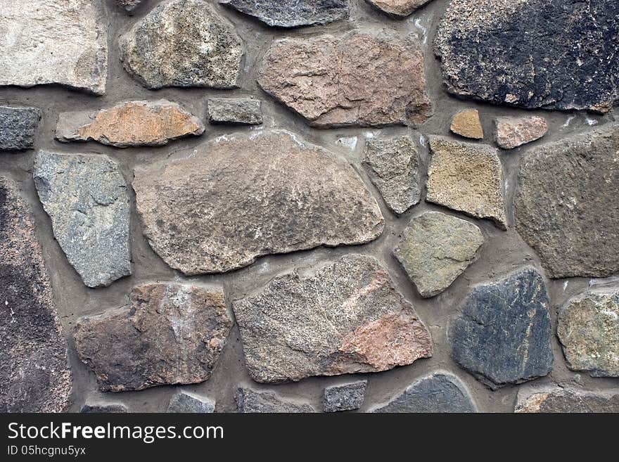 Wall from a natural stone. Wall from a natural stone.