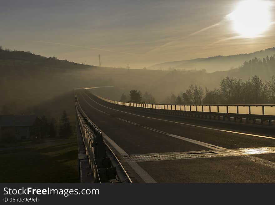 Bridge In The Mountains During Sunrise