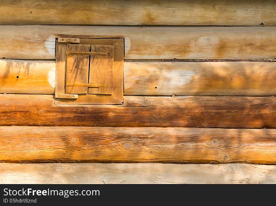 Window of the old wooden house. Window of the old wooden house