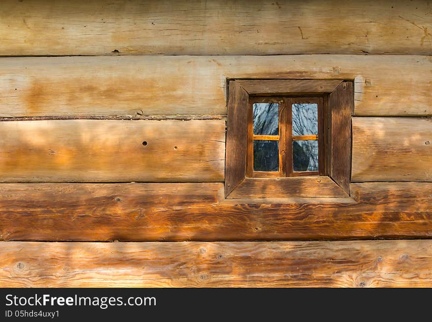 Window of the old wooden house. Window of the old wooden house