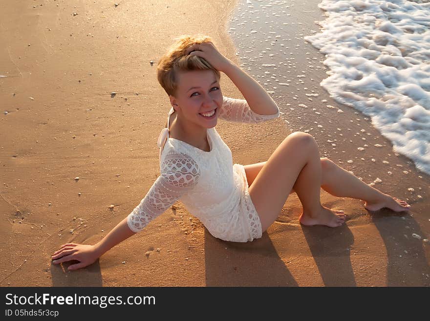 Smiling girl at summer sea beach. Smiling girl at summer sea beach