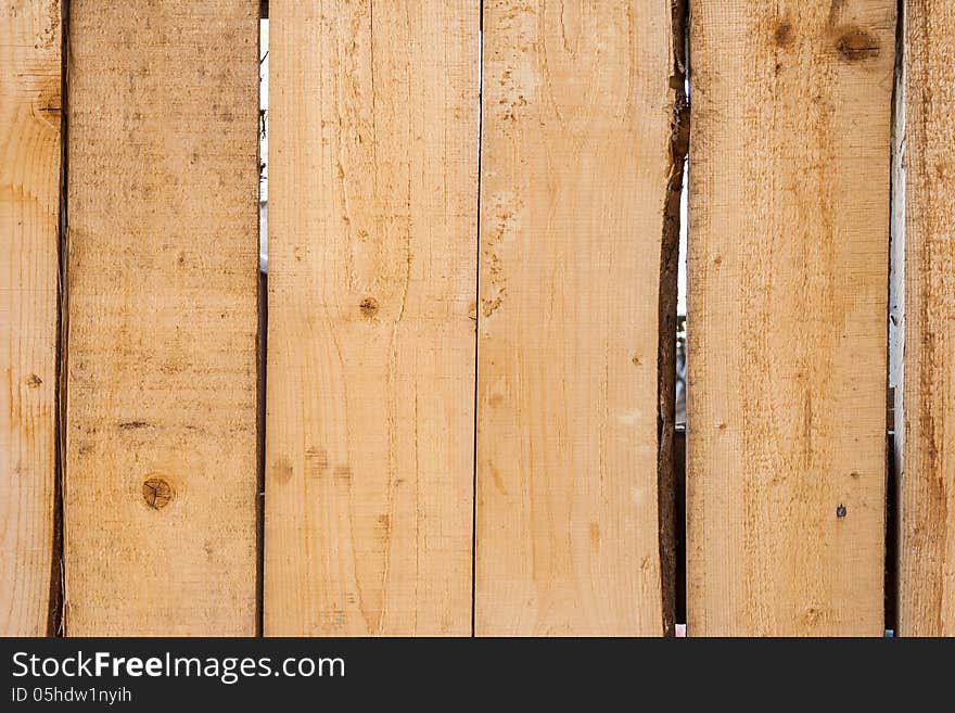 Unpainted wooden fence