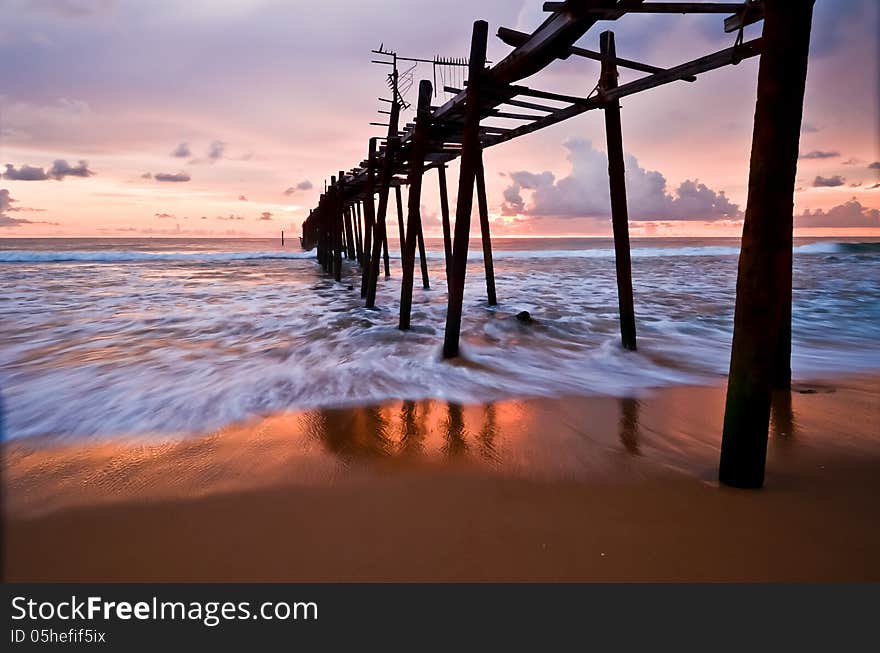 Wood bridge to the sea