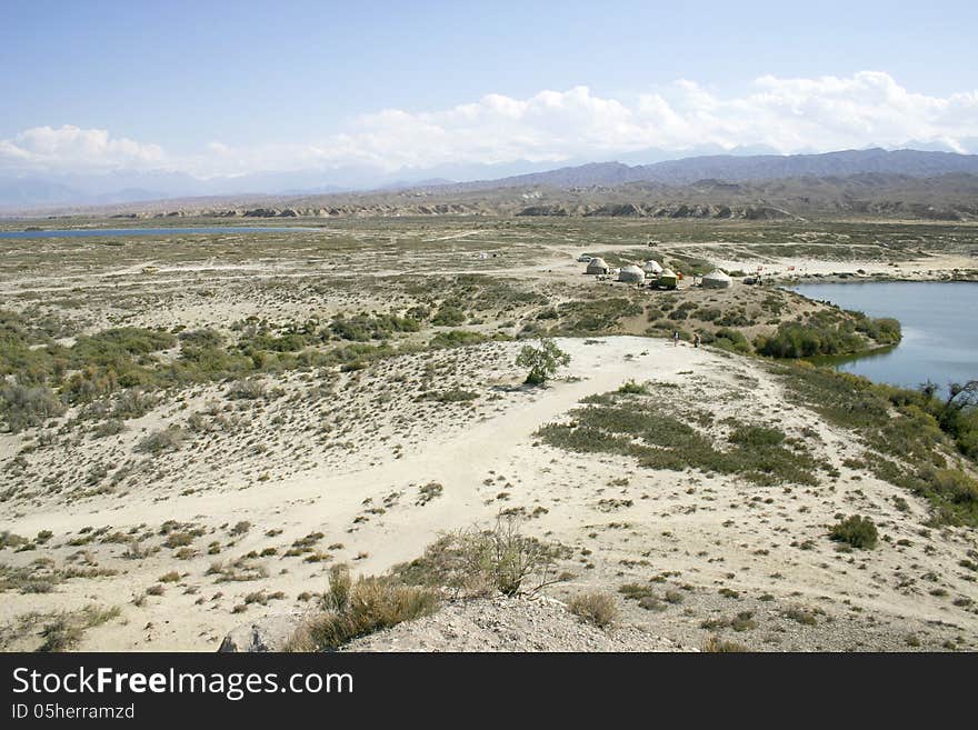 Sandy coast of lake.