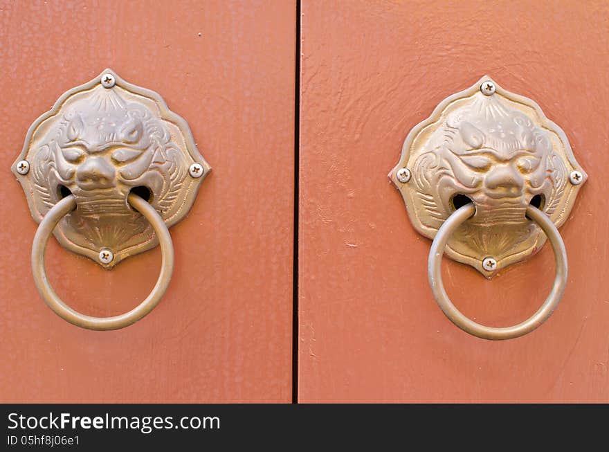 Double Doorknob On Background