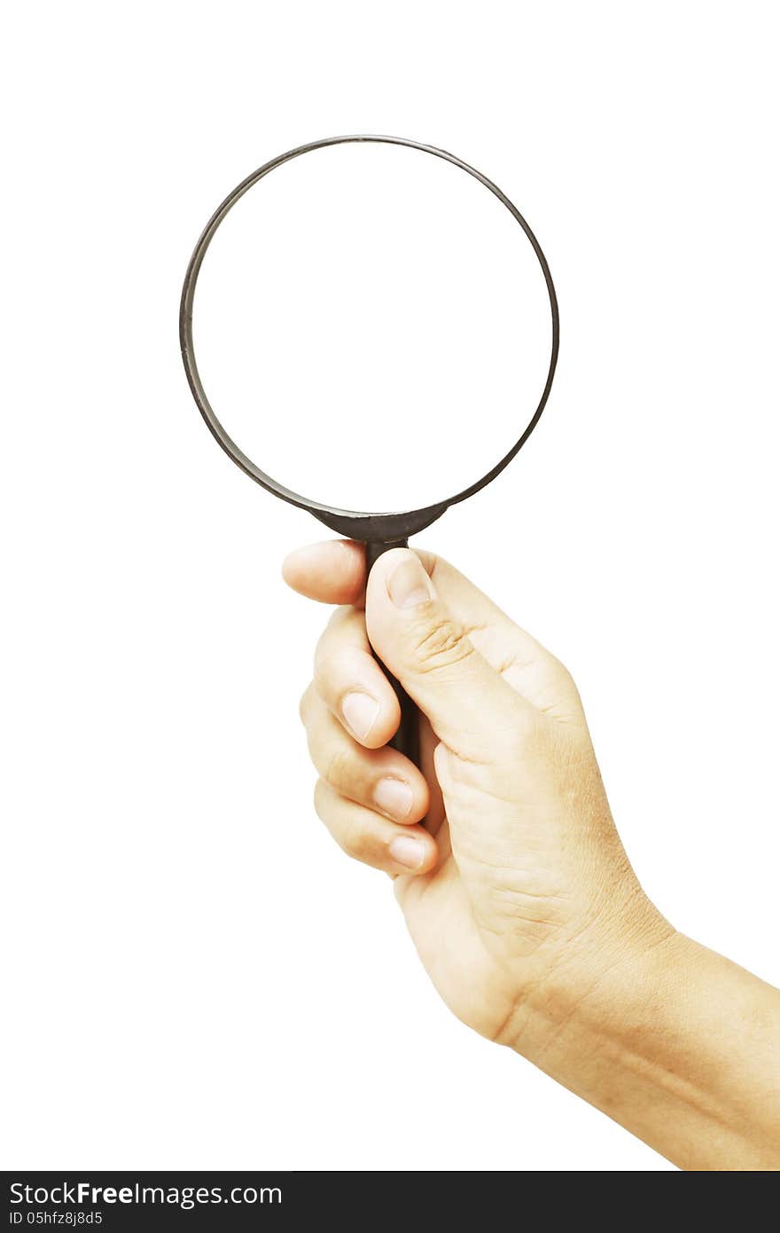 Hand holding magnifying glass isolated on white background