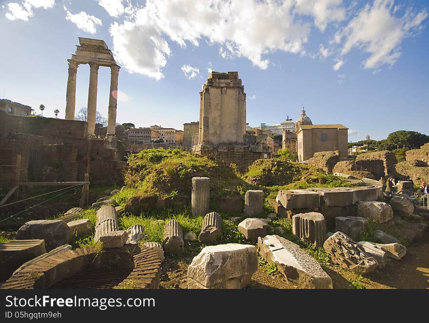 Taking a stroll on the ruins of Foro Romano on a sunny day. Taking a stroll on the ruins of Foro Romano on a sunny day