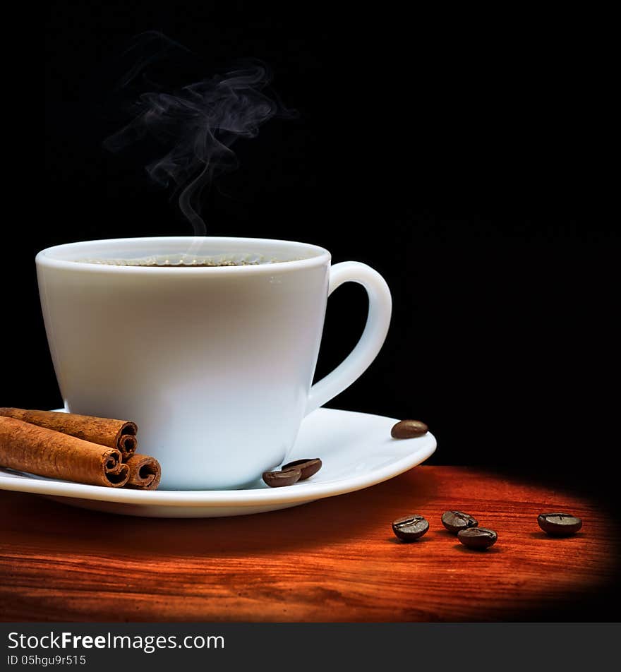 Warm cup of coffee on black background. Warm cup of coffee on black background