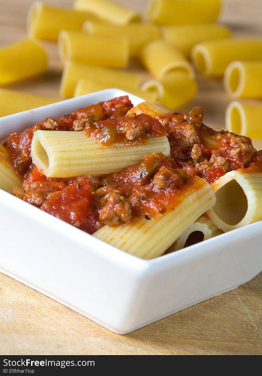 Rigatoni pasta tube with meat sauce