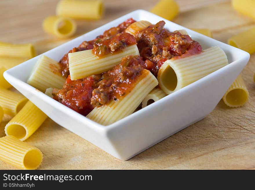 Rigatoni pasta tube with meat sauce