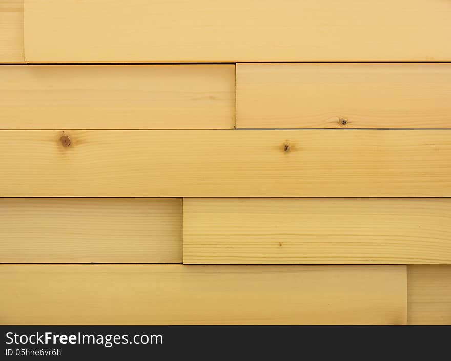 Detail of a modern wooden background with blocks and parallel lines. Detail of a modern wooden background with blocks and parallel lines.