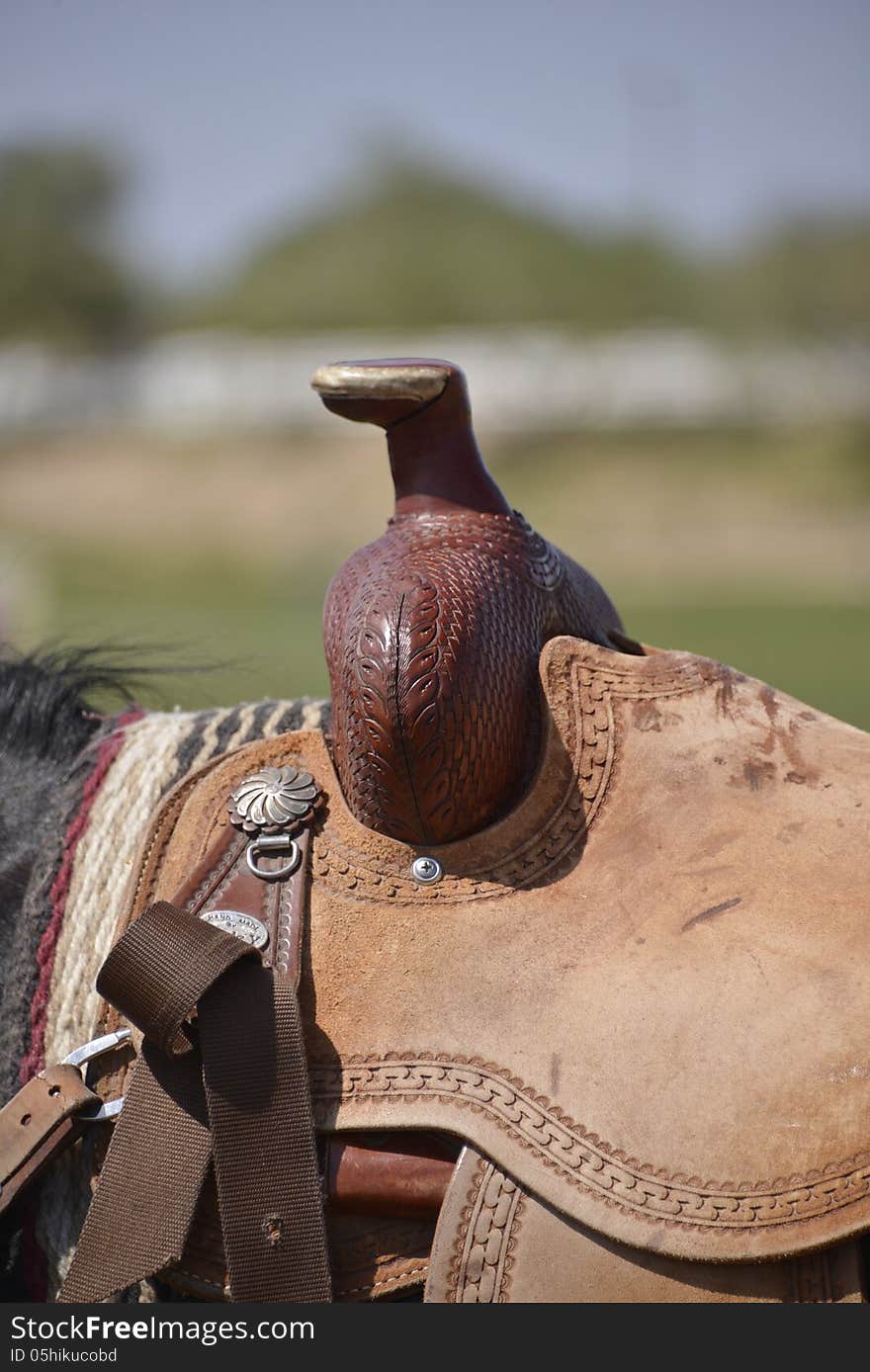 Saddle in closeup with carved pattern