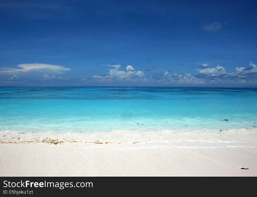 White beach with beautiful sunny sky. White beach with beautiful sunny sky